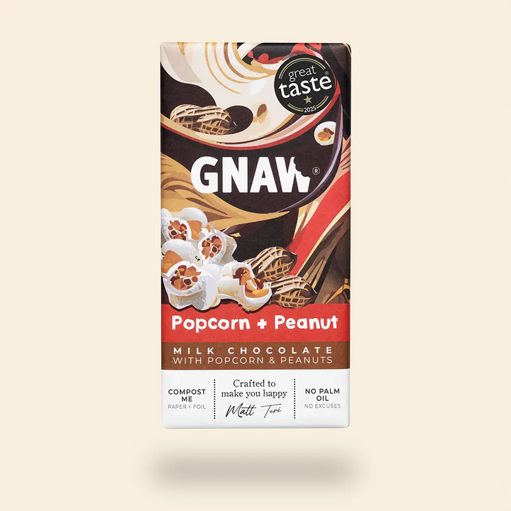Product shot of GNAW Popcorn + Peanut chocolate bar with Great Taste Award logo